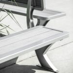 backless recycled plastic commercial outdoor street and patio bench in a business center
