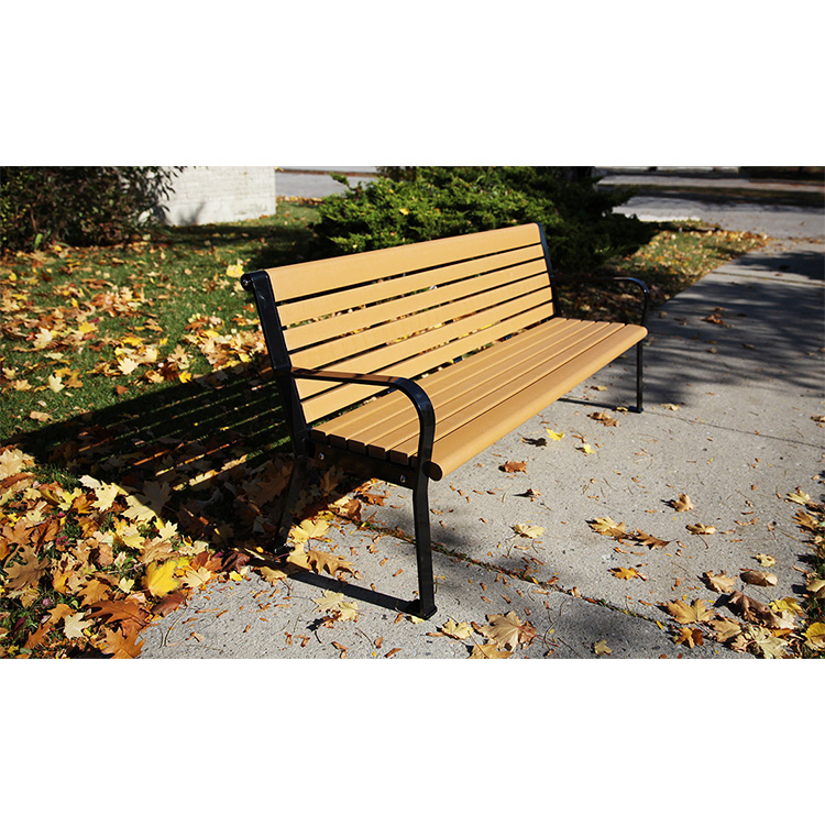 recycled plastic outdoor park and memorial bench standing quietly in a beautiful fall afternoon. This bench is a great option for gardens too