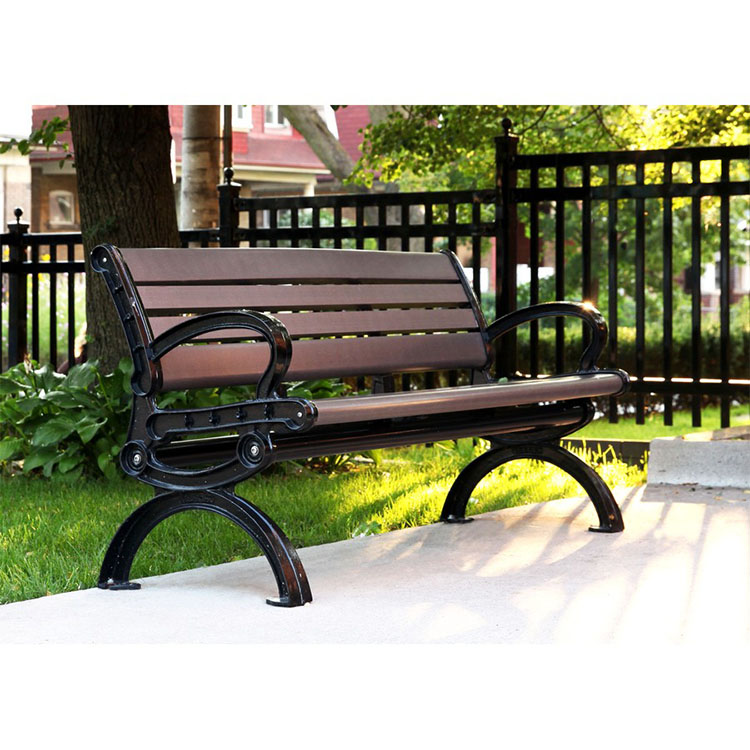 a recycled plastic lumber memorial garden and park bench installed in a nice and quiet residential area