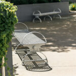 steel outdoor park and metro benches strengthened street park functionality by providing a place for passersby to rest