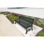 metal-built memorial garden benches in a newly constructed campus garden