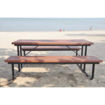 recycled plastic park picnic table is set on the beach or visitors