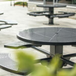 commercial steel garden picnic tables fit perfectly into the real estate's landscape architecture design