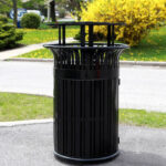 classic outdoor metal trash can with a lid which is featured with an ashtray strictly following fire code compliance