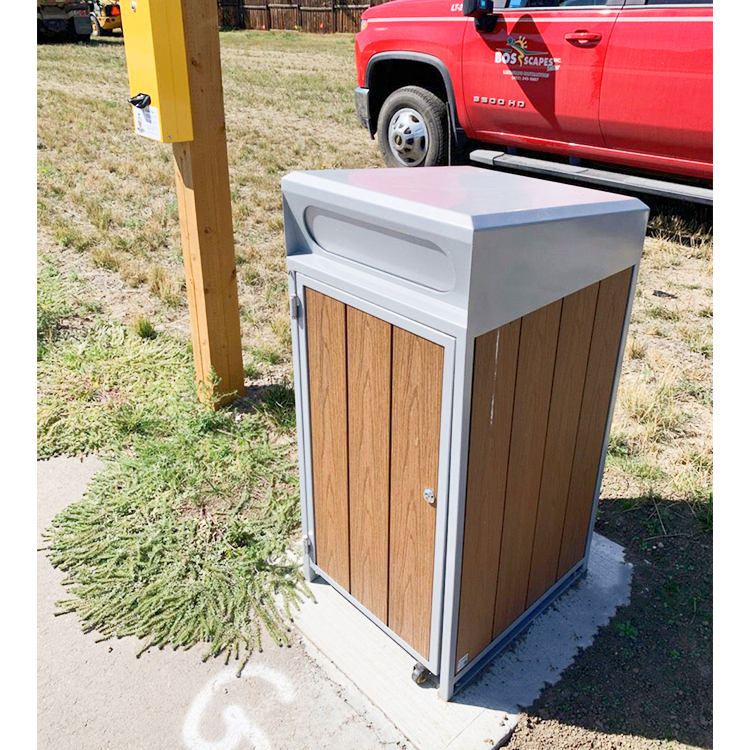 outdoor commercial park trash bin installed in a park's parking area in the City of Lethbridge