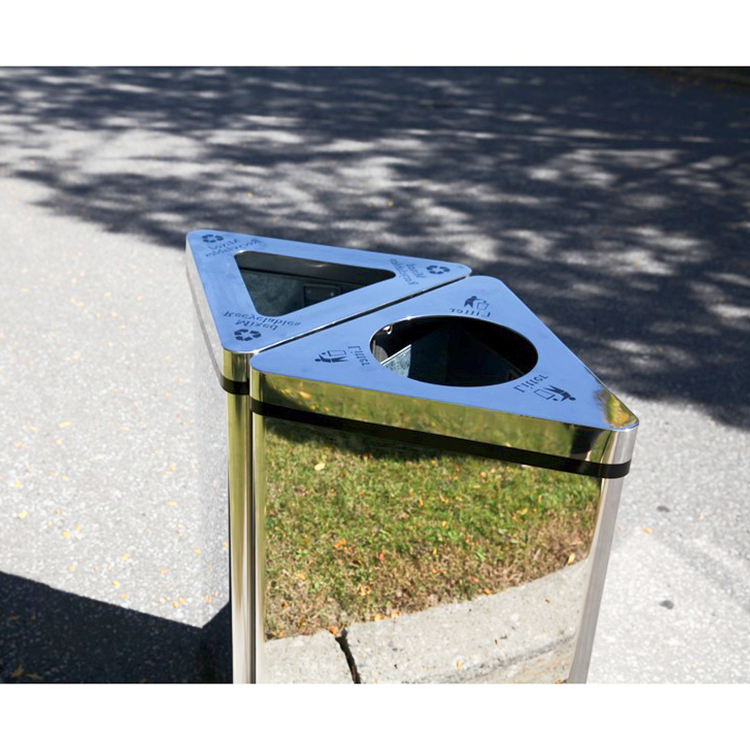 Outdoor stainless-steel recycling receptacles in a custom bin combination is doing its job on the street