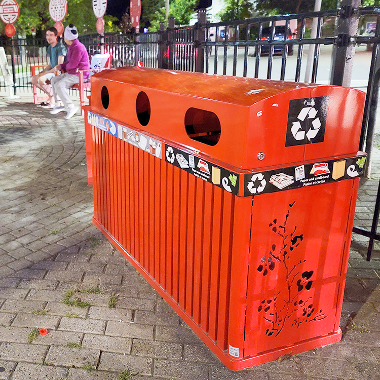 outdoor park recycling stations in a custom color and drawing are placed in Chinatown Ottawa