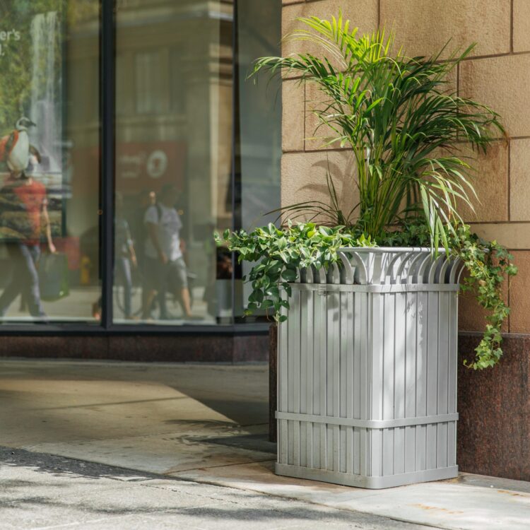 outdoor steel park planter at a storefront