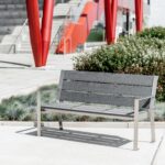TTC custom recycled plastic commercial metro bench features a real wood appearance at one of its metro station
