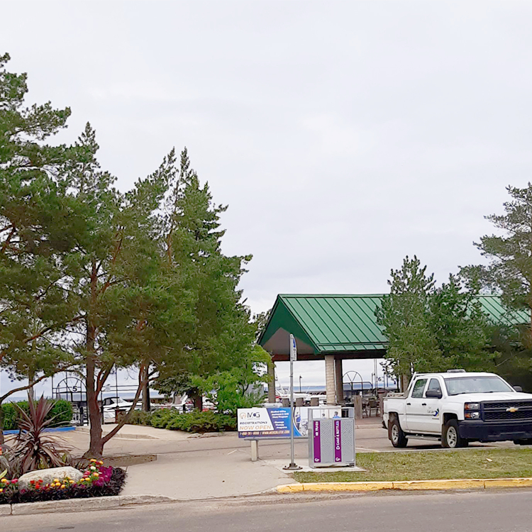 outdoor commercial park recycling and trash receptacle is at the information center of a national park in the City of Cold Lake