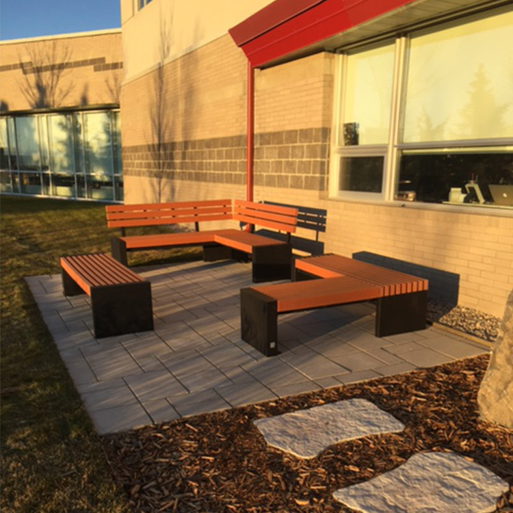 commercial outdoor recycled plastic patio benches in the beautiful sunset